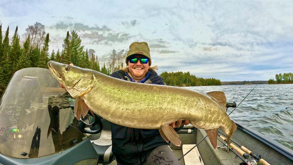 Northern Wisconsin Fishing Guide Captain Curtis "Cletus" Cecchi holding a hefty musky